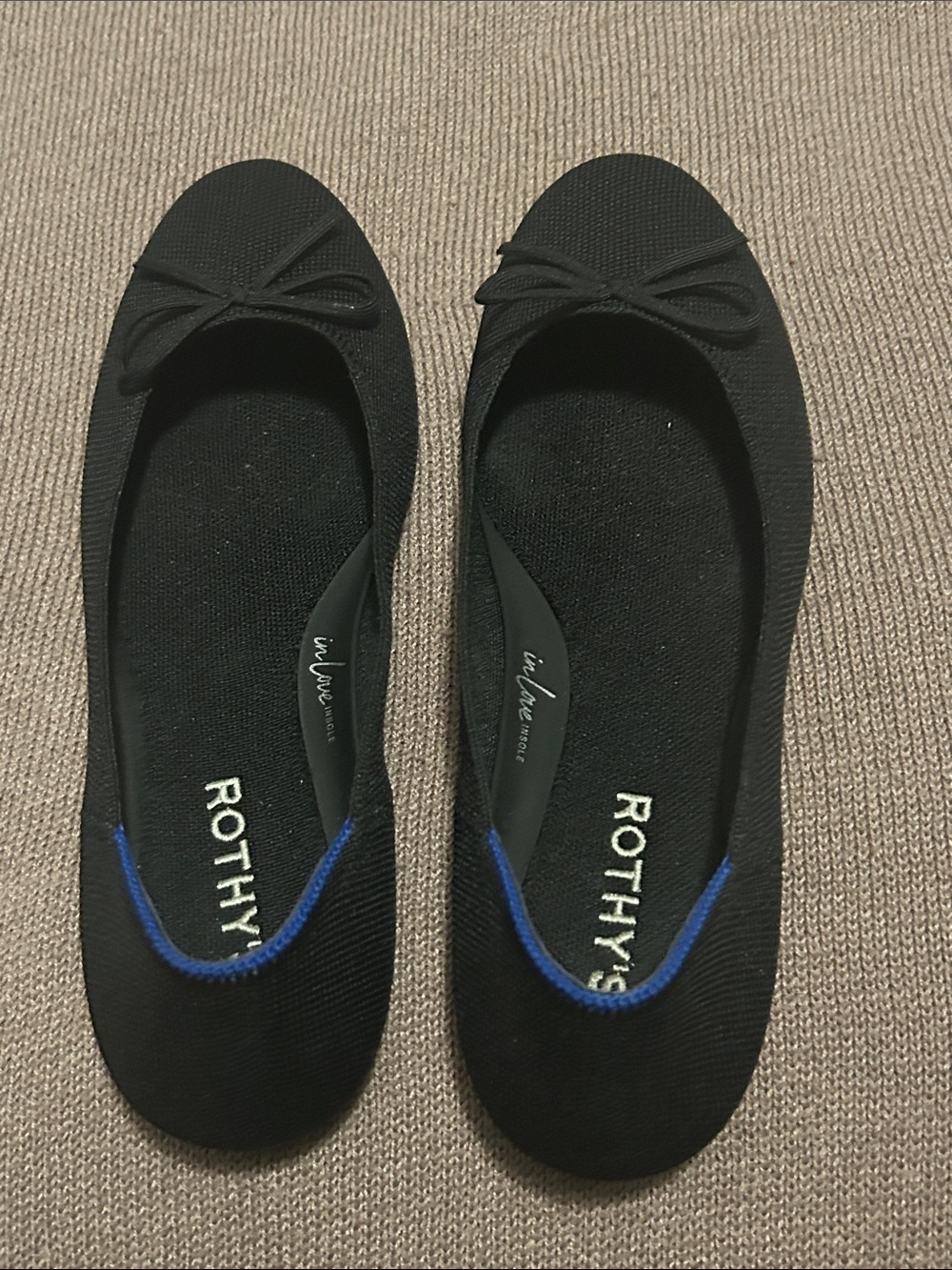Rothy's Black Ballet Flats with Blue Trim